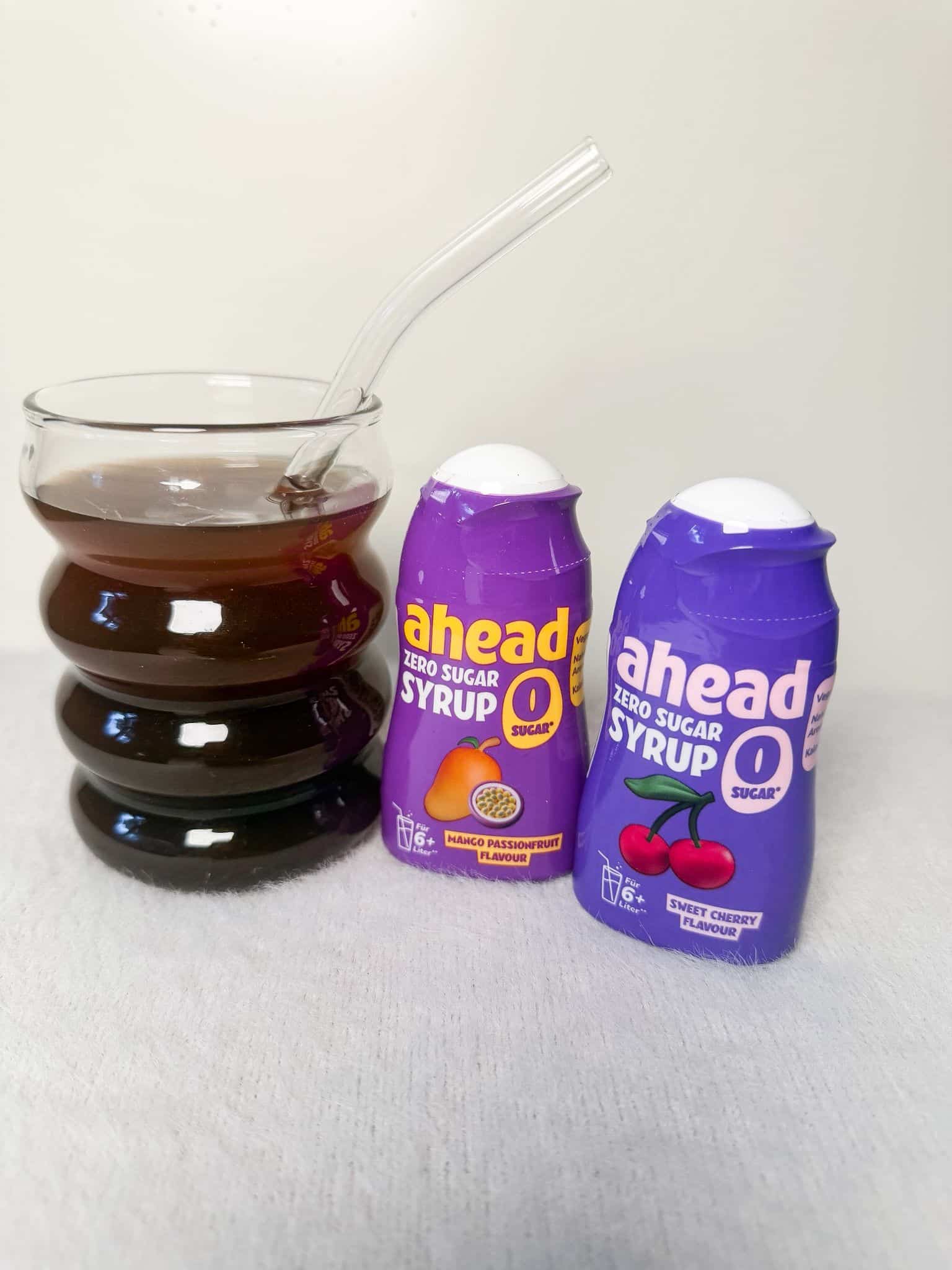 ahead-nutrition-zero-sugar-sirup-sweet-cherry-mango-passionfruit Zero Sugar Sirup von ahead nutrition in den Sorten Sweet Cherry und Mango Passionfruit