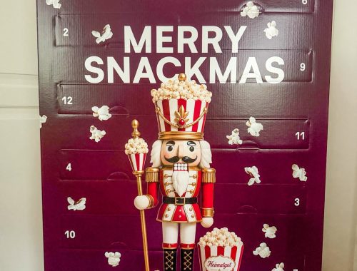 Heimatgut Adventskalender 2026 mit 24 veganen Bio-Snacks und 10 % Rabattcode ISABELLA_HG.